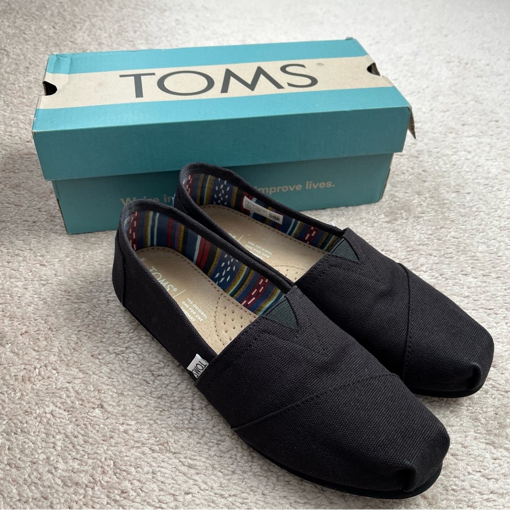 TOMS Black Canvas Slip-Ons